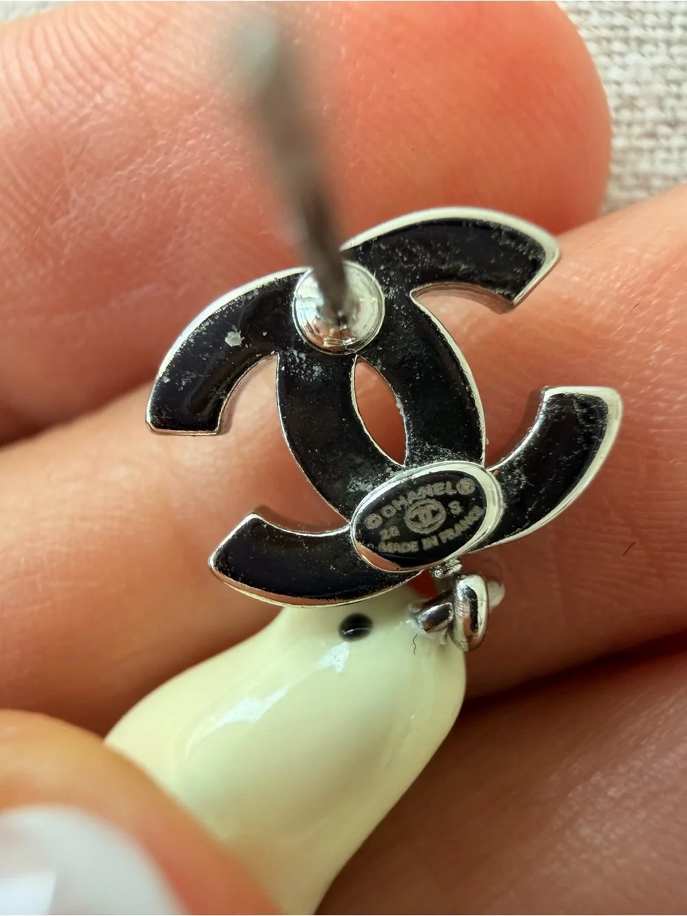 CHANEL White Enamel Chicken CC Drop Earrings with Orange Accents